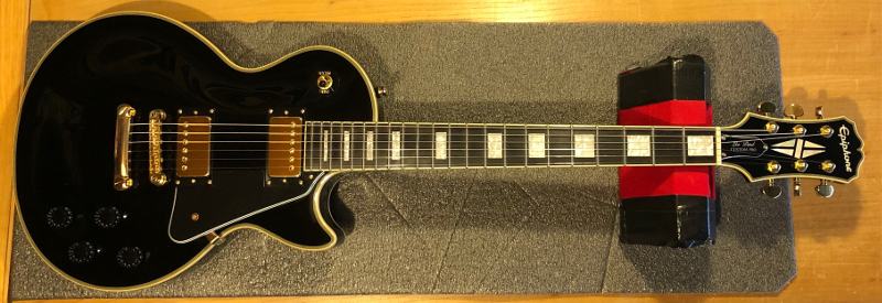 Epiphone Les Paul Custom. Upgraded pickups to Bare Knuckle Stormy Mondays, vinatge style wiring harness, Frel Level and setup.